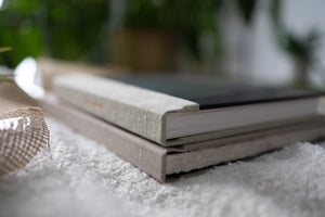 Hahnemuhle Baryta Bamboo fine art album from QTALBUMS with choice of regular straight-cut page edges, or hand-torn, deckled-edge pages. 